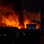 Ukraine says it struck a Russian air base as Moscow sent hundreds of drones into Kyiv