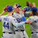 Dodgers survive late rally to win MLB playoff opener