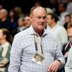 Colorado athletics director who hired Deion Sanders to step down next year